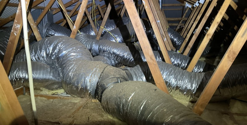 air conditioning ducts installed in the roof of a house. 