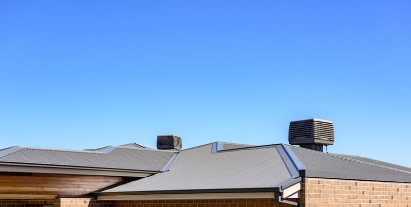 evaporative cooling system on a house roof